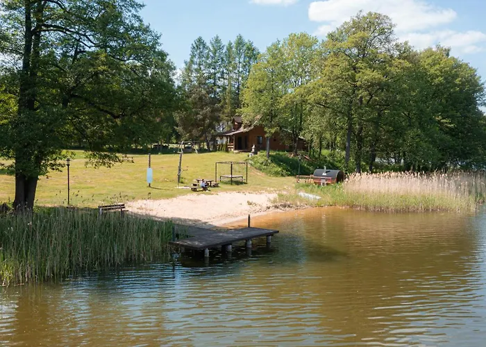 Dom nad jeziorem Winiec Mazury Sauna Plaża Linia Brzegowa Morsowanie Wędkowanie Miłomłyn