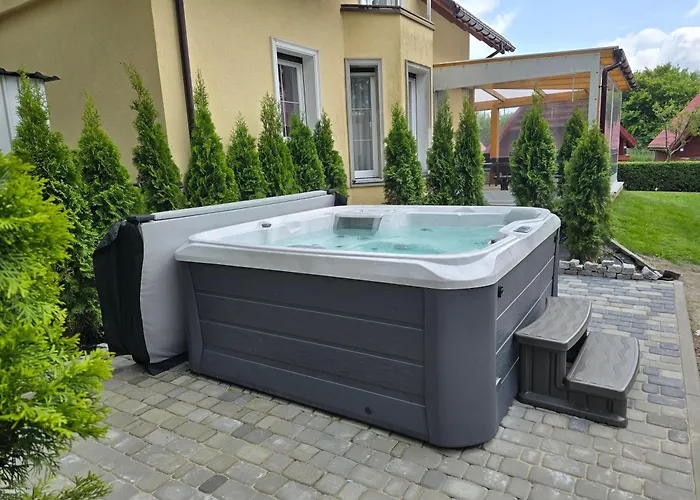 Domki Słoneczko z dostępem do jacuzzi sauny i rowerów Dźwirzyno