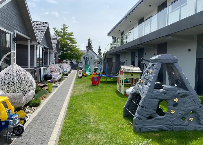 Domki Apartamentowe Skandynawia z Basenem Dąbki